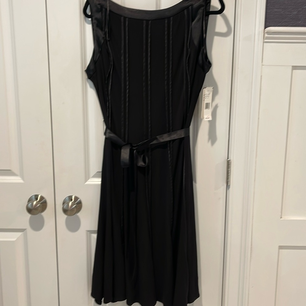 Brand new black cocktail dress.